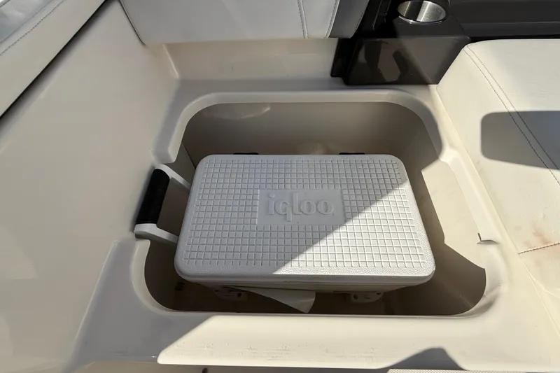  Yacht Photos Pics Storage compartment with Igloo cooler in 2014 Monterey 328SS Super Sport boat.