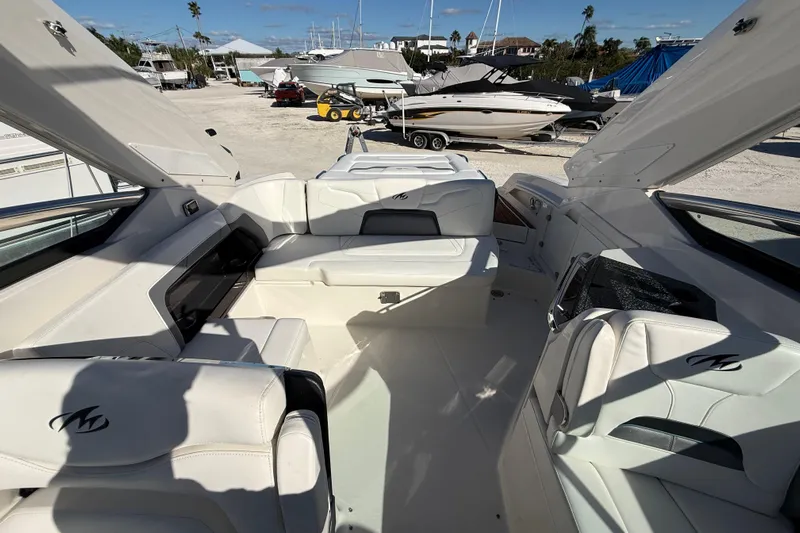  Yacht Photos Pics Interior of a 2014 Monterey 328SS Super Sport boat with white seating.