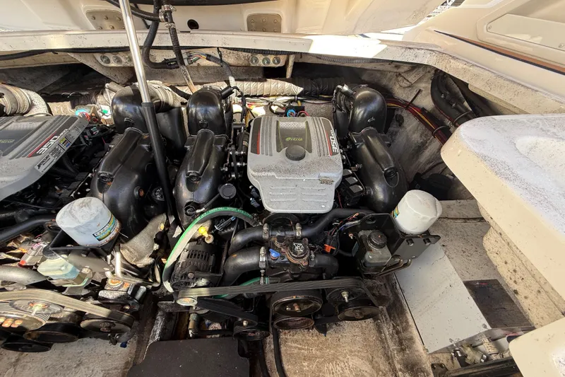  Yacht Photos Pics Engine compartment of a 2014 Monterey 328SS Super Sport boat, showcasing dual engines.
