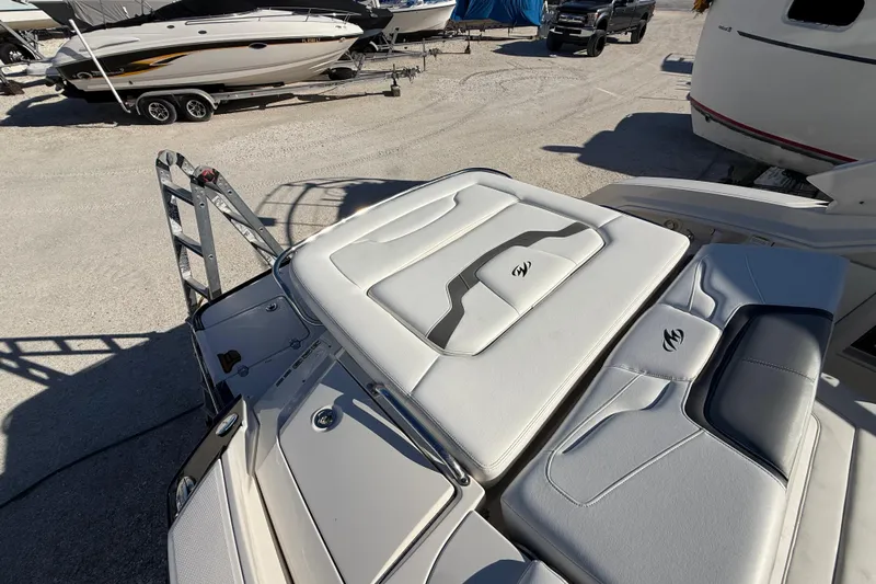  Yacht Photos Pics 2014 Monterey 328SS Super Sport boat with sleek white seating and ladder.