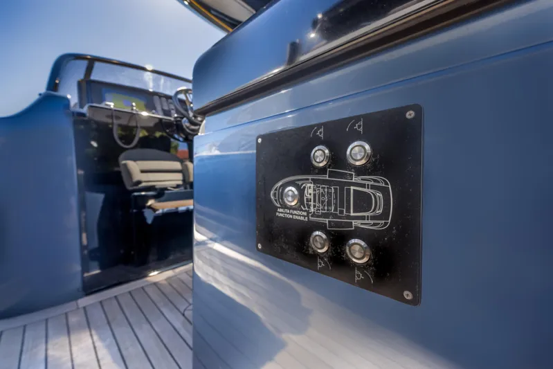 Salt Escape Yacht Photos Pics 2021 Solaris Power 48 OPEN yacht interior with control panel and seating.