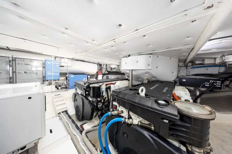 Salt Escape Yacht Photos Pics Engine room of 2021 Solaris Power 48 OPEN yacht, showcasing modern equipment and design.