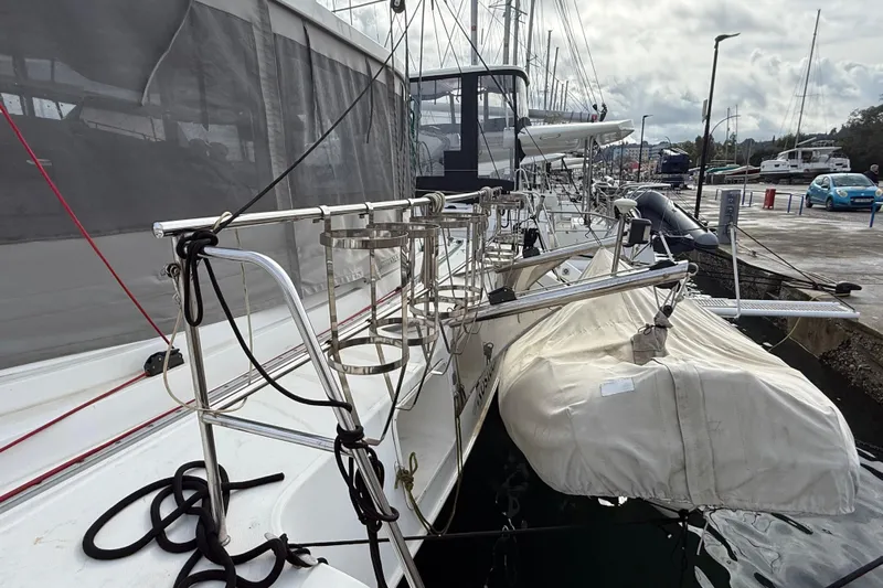  Yacht Photos Pics 2003 Fountaine Pajot Belize 43 catamaran docked, featuring deck details and mooring lines.