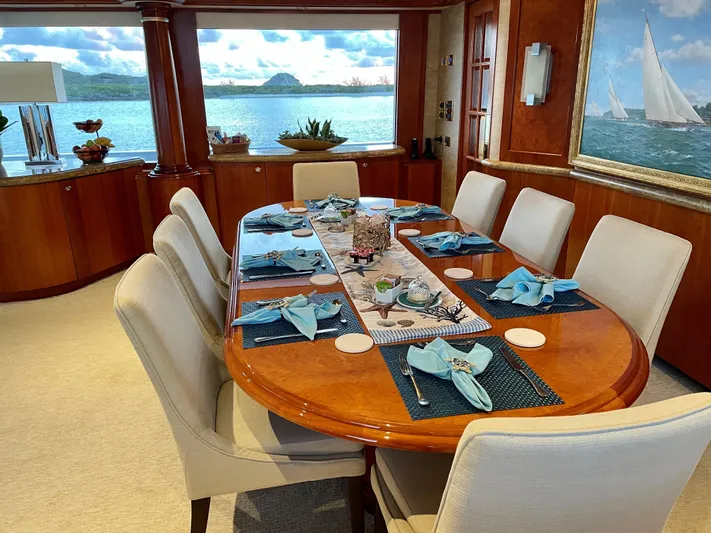 Relentless Yacht Photos Pics Elegant dining area on 2006 Westport Tri-Deck Motoryacht.