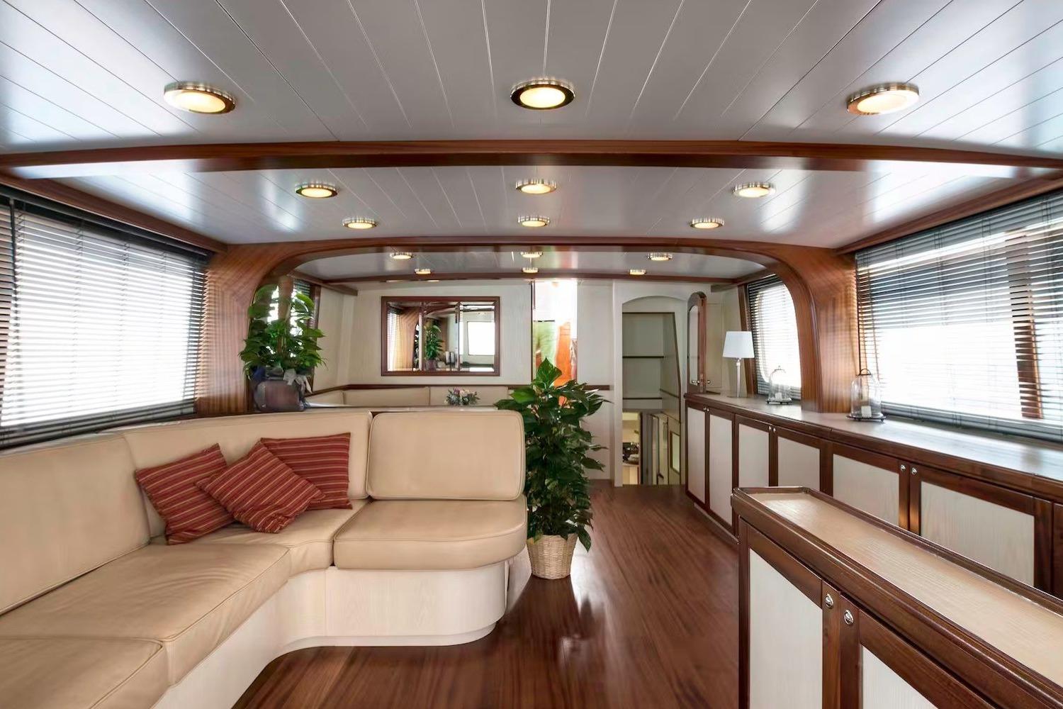 Main Saloon – Rebuilt Interior with Warm Woodwork