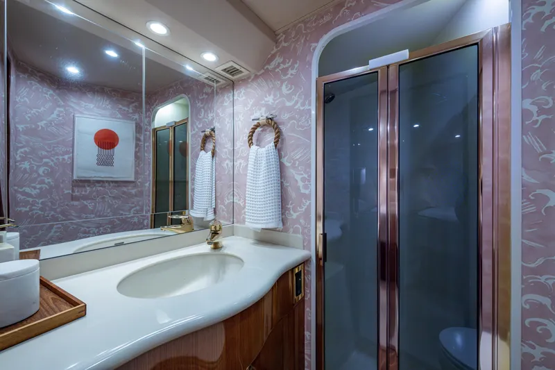 Sweet Melissa Yacht Photos Pics Luxurious bathroom in 2004 Viking 48 Convertible yacht with elegant fixtures and modern design.