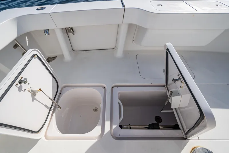 Sweet Melissa Yacht Photos Pics Open storage compartments on a 2004 Viking 48 Convertible boat deck.