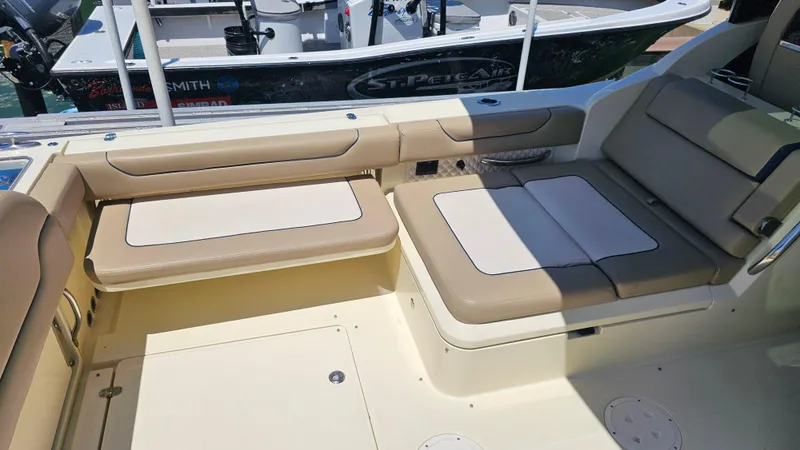  Yacht Photos Pics 2022 Chris-Craft Calypso 35 boat interior with beige seating and spacious layout.