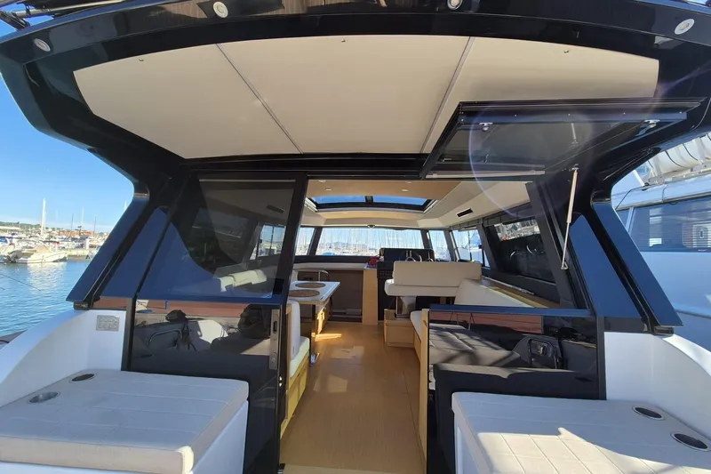  Yacht Photos Pics 2023 Pardo Yachts GT52 interior view, showcasing luxurious seating and modern design.