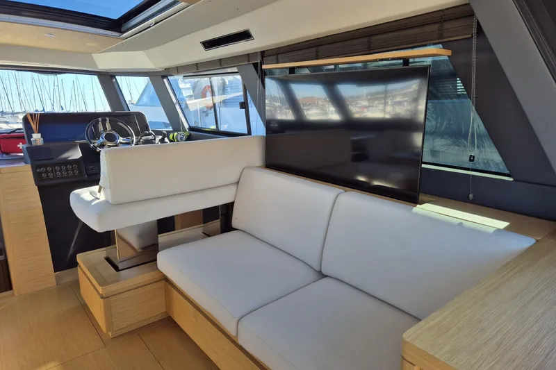 Yacht Photos Pics Luxurious interior of 2023 Pardo Yachts GT52 with modern seating and helm.