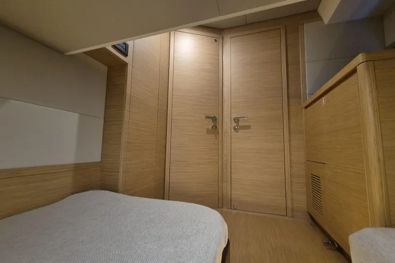  Yacht Photos Pics Interior of 2023 Pardo Yachts GT52, featuring wooden cabinetry and modern design elements.