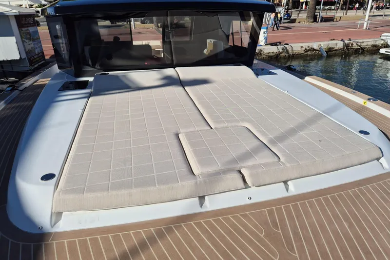  Yacht Photos Pics 2023 Pardo Yachts GT52 with spacious sunbathing deck, docked at marina.