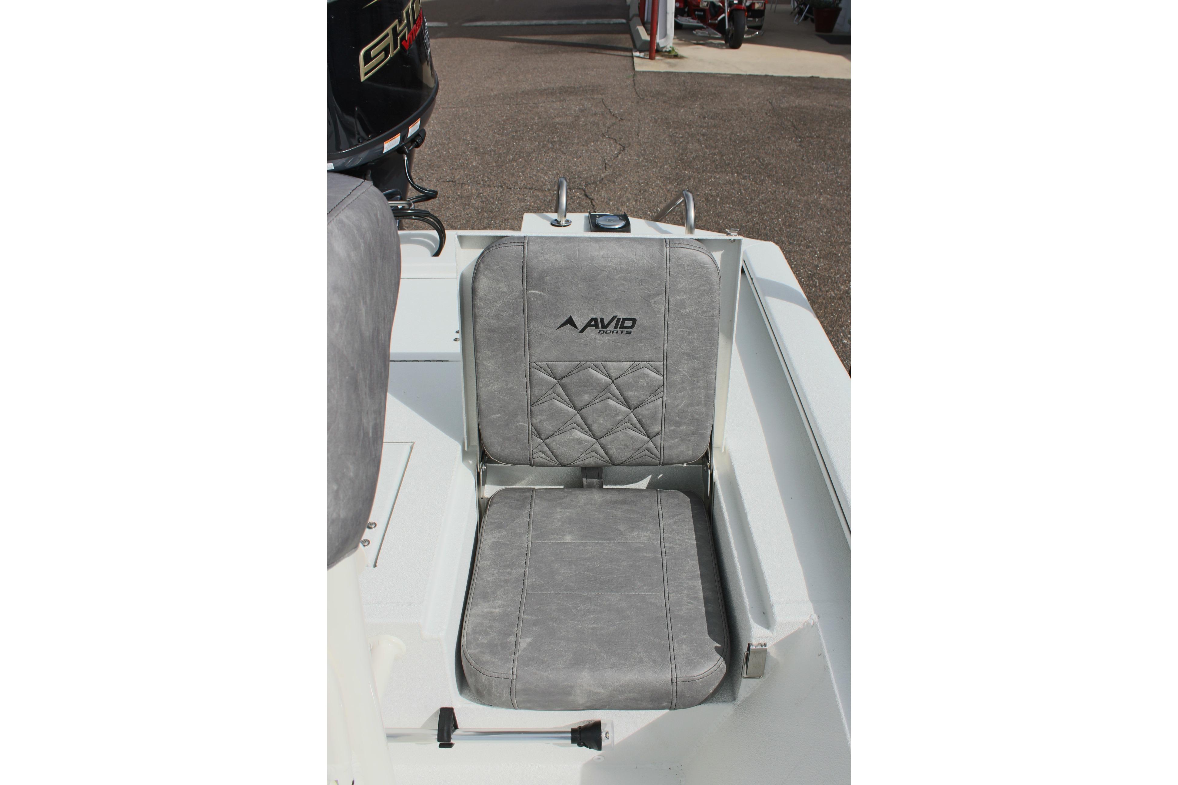 Gray seat on 2026 Avid 19 FSX boat, featuring quilted design and logo.