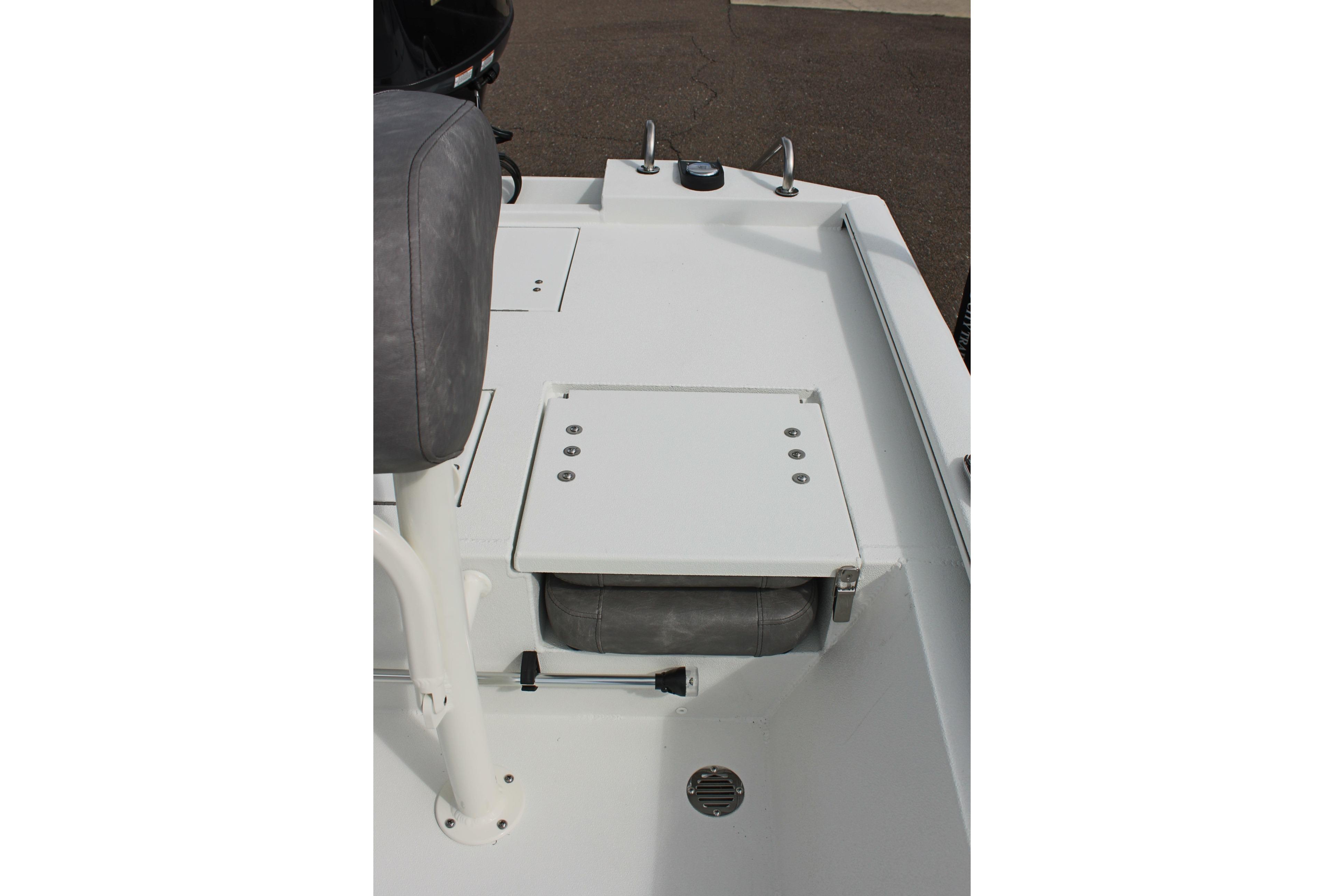 Avid 19 FSX 2026 boat interior with seating and storage compartments.