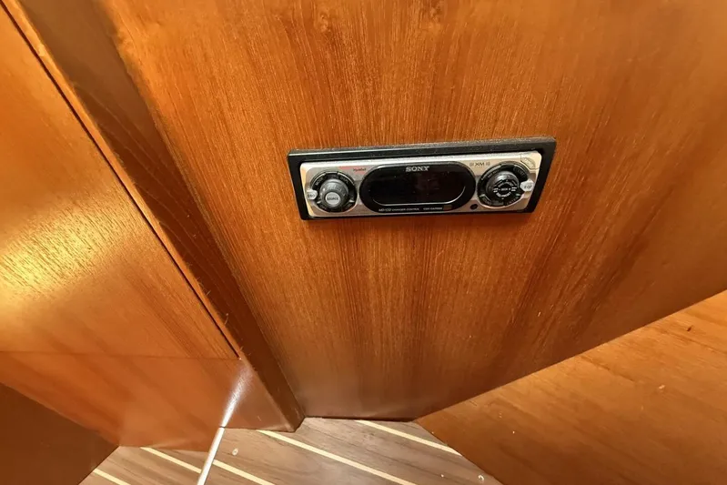  Yacht Photos Pics Sony stereo system on wooden panel in 2005 Hunter 46LE boat interior.