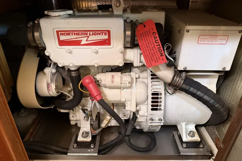  Yacht Photos Pics Northern Lights generator in a 2005 Hunter 46LE yacht engine compartment.