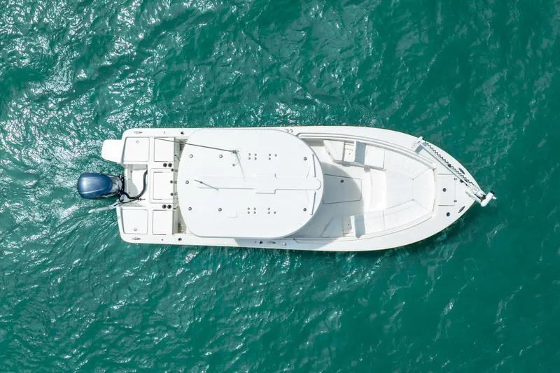  Yacht Photos Pics Aerial view of 2021 Regulator 26XO boat on turquoise water.
