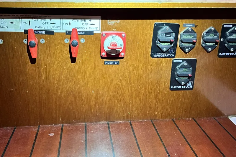 Windnsea Yacht Photos Pics Electrical panel of a 2001 Beneteau 473 sailboat with switches and controls.