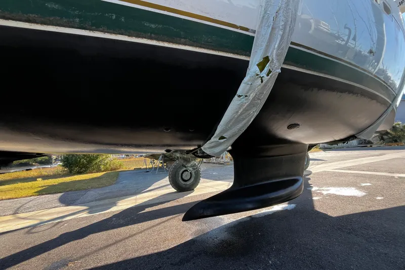 Windnsea Yacht Photos Pics Bottom view of a 2001 Beneteau 473 sailboat on a trailer, showing the keel and hull.