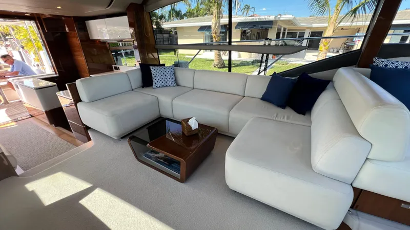 Sea Sea Elle Yacht Photos Pics Luxurious interior of 2019 Princess F62 yacht with white seating and modern decor.