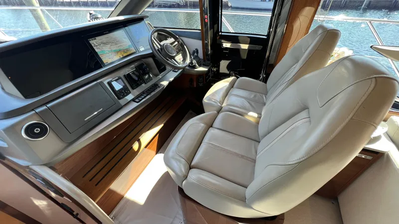 Sea Sea Elle Yacht Photos Pics Interior of 2019 Princess F62 yacht with leather seats and modern dashboard.