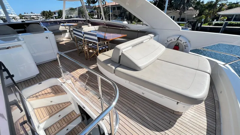 Sea Sea Elle Yacht Photos Pics Luxurious 2019 Princess F62 yacht deck with seating and dining area.