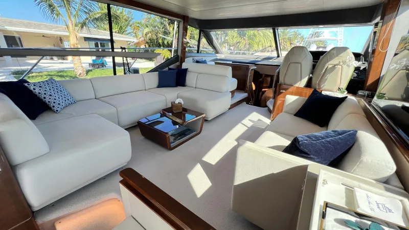 Sea Sea Elle Yacht Photos Pics Luxurious interior of 2019 Princess F62 yacht with spacious seating and modern design.