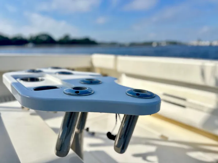 Steamer Yacht Photos Pics Albemarle 410 Express Fisherman 2008 boat detail with rod holders, ocean in background.