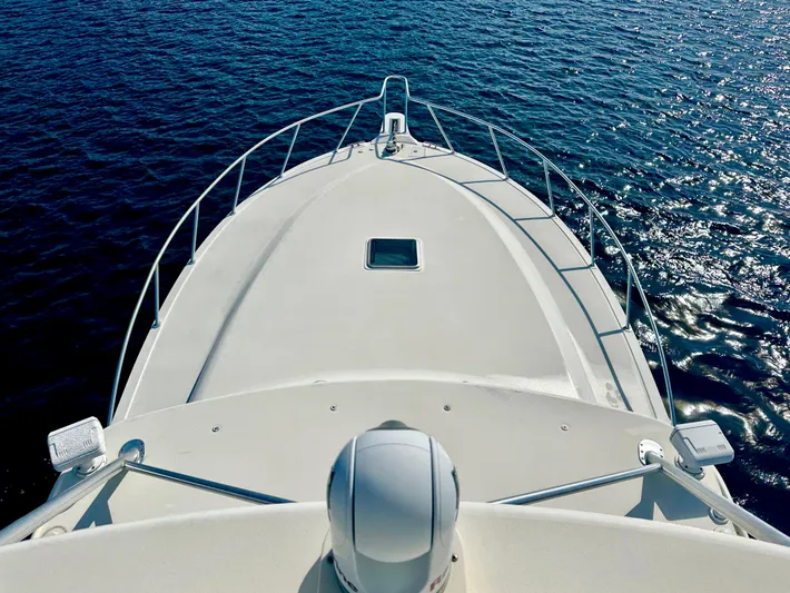 Steamer Yacht Photos Pics Albemarle 410 Express Fisherman 2008 boat deck on calm blue water.