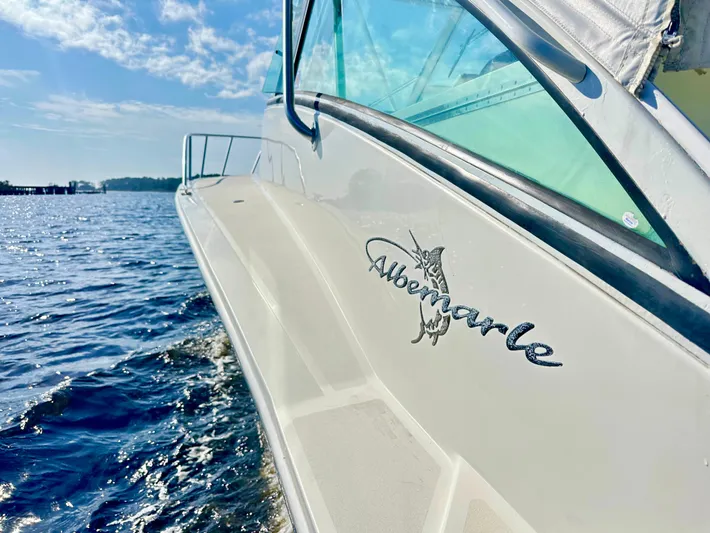 Steamer Yacht Photos Pics 2008 Albemarle 410 Express Fisherman boat on water, sunny day, side view.