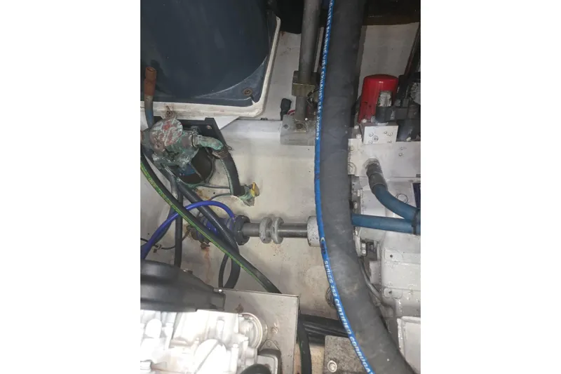 Steamer Yacht Photos Pics Engine compartment of 2008 Albemarle 410 Express Fisherman with visible hoses and components.