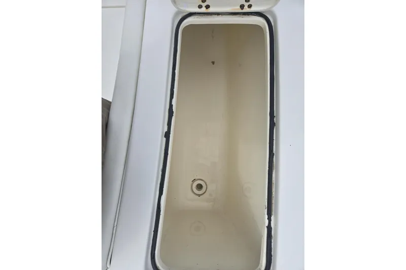 Steamer Yacht Photos Pics Open storage compartment on 2008 Albemarle 410 Express Fisherman boat.