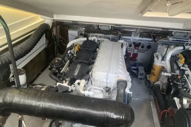 Steamer Yacht Photos Pics Engine room of 2008 Albemarle 410 Express Fisherman, showcasing dual engines and control systems.