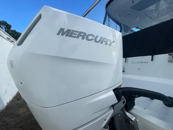  Yacht Photos Pics 2024 Beneteau Gran Turismo 32 with Mercury outboard engine, close-up view.