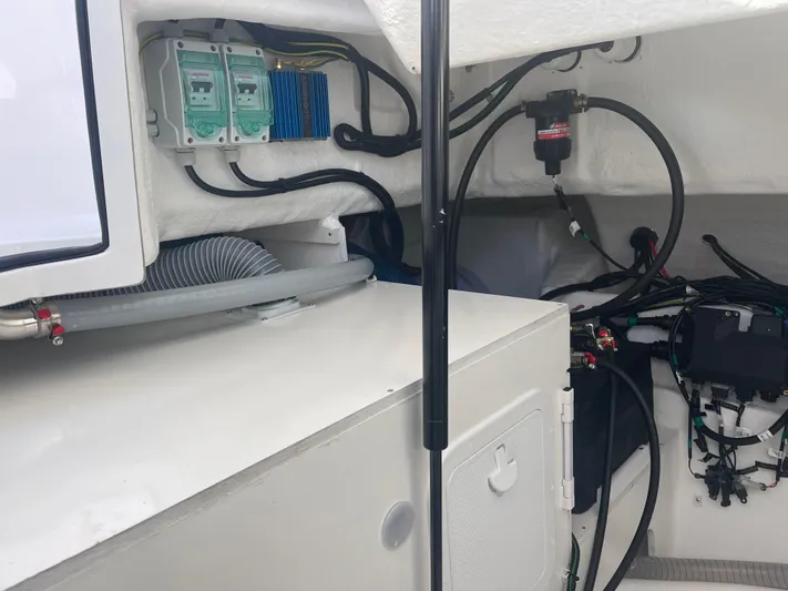  Yacht Photos Pics 2024 Beneteau Gran Turismo 32 engine compartment showcasing wiring and components.