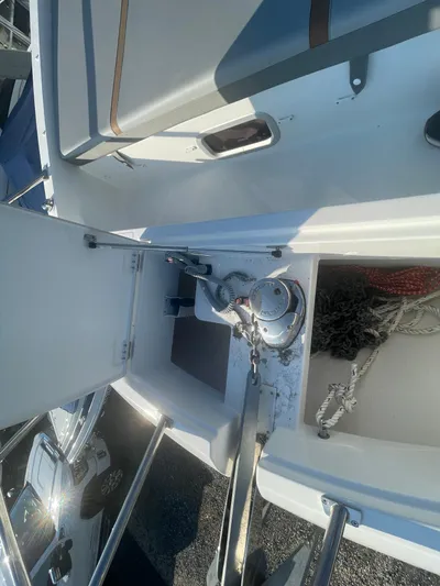  Yacht Photos Pics 2024 Beneteau Gran Turismo 32 yacht deck with anchor storage and winch.