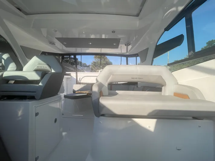  Yacht Photos Pics 2024 Beneteau Gran Turismo 32 interior with modern seating and sleek design.