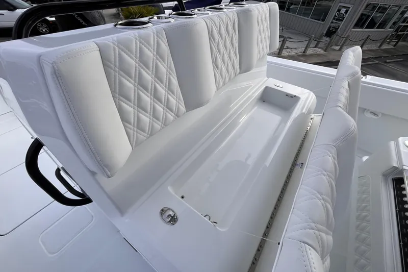 Yacht Photos Pics Luxurious seating on 2026 Invincible 33 Catamaran with diamond-stitched upholstery.