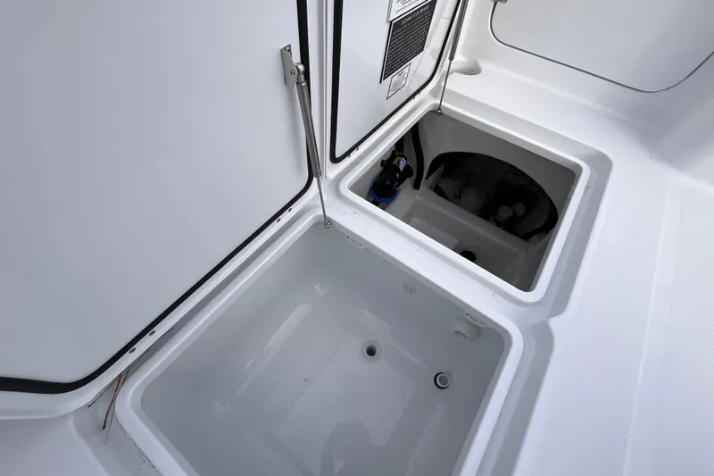  Yacht Photos Pics 2026 Invincible 33 Catamaran storage compartments, showcasing sleek design and functionality.