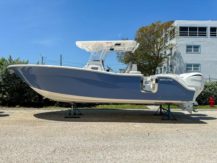  Yacht Photos Pics 2024 Sea Fox 288 Commander boat on display outdoors.