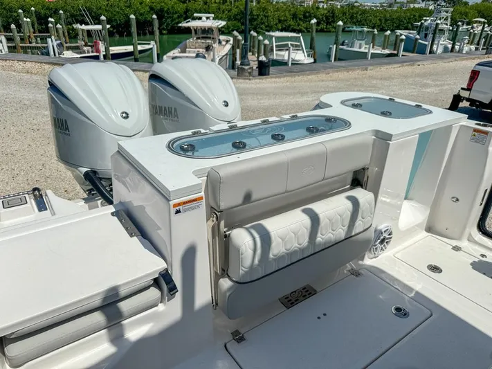  Yacht Photos Pics 2024 Sea Fox 288 Commander boat with dual Yamaha engines at a marina.