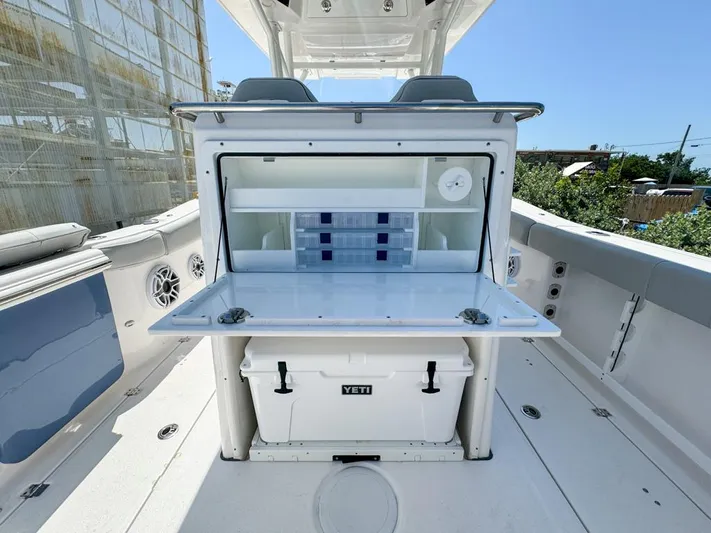  Yacht Photos Pics 2024 Sea Fox 288 Commander boat with open storage and Yeti cooler.