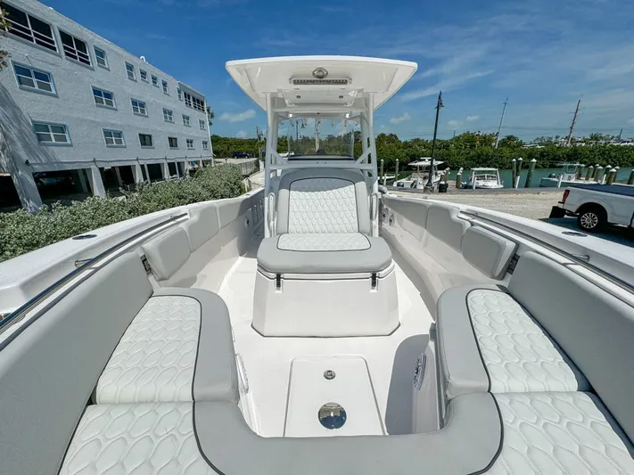  Yacht Photos Pics 2024 Sea Fox 288 Commander boat with luxurious seating and modern design.