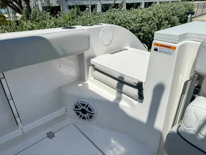  Yacht Photos Pics 2024 Sea Fox 288 Commander boat interior with seating and speaker.