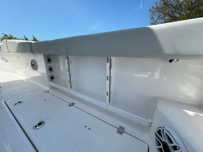  Yacht Photos Pics 2024 Sea Fox 288 Commander boat interior with storage compartments and seating.