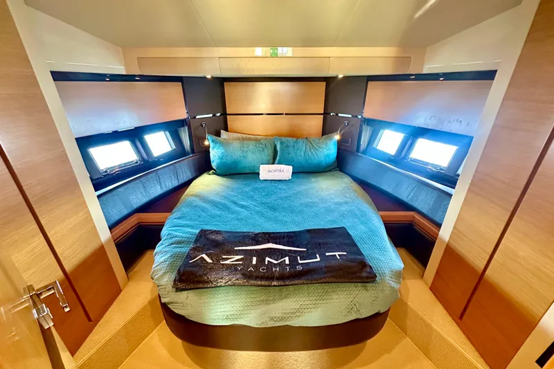  Yacht Photos Pics Luxurious bedroom interior of 2011 Azimut Fly 53 yacht with elegant bedding.