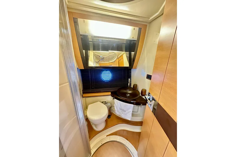  Yacht Photos Pics Luxurious bathroom in 2011 Azimut Fly 53 yacht with modern fixtures and elegant design.