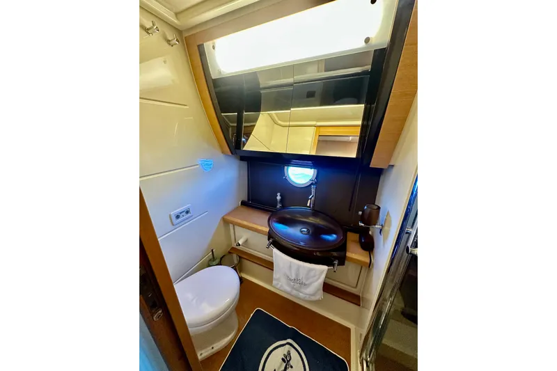  Yacht Photos Pics Luxurious bathroom in 2011 Azimut Fly 53 yacht with modern fixtures and elegant design.