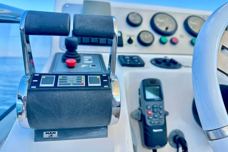  Yacht Photos Pics Control panel of a 2011 Azimut Fly 53 yacht with throttle and navigation instruments.