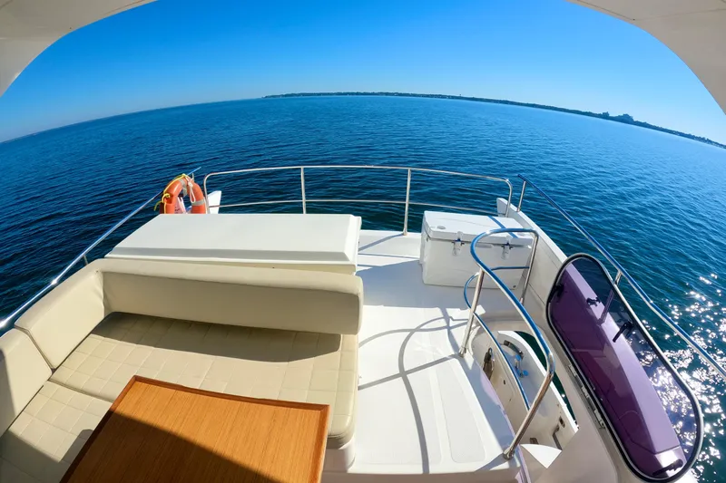  Yacht Photos Pics Luxurious 2011 Azimut Fly 53 yacht deck with ocean view and seating area.